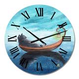 Designart 'A Cat In A Boat With Lantern And With A Black Bird' Nautical & Coastal wall clock