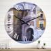 Designart 'Architectural Arc In Italian City' Colonial wall clock