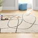 White 115 x 79 x 1.38 in Area Rug - Wade Logan® Rectangle Audeliz Abstract Machine Made Power Loom Polypropylene Area Rug in Cream | Wayfair