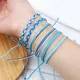 Bracelets tressés série bleue pour femmes et hommes breloque à nœud en corde tissage