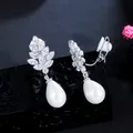 CWWZircons – boucles d'oreilles en zircon cubique brillant en forme de feuille perles pendantes Non