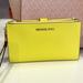 Michael Kors Bags | Michael Kors Jet Set Travel Large Double Zip Leather Wristlet Sunshine Yellow | Color: Gold/Yellow | Size: Large