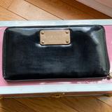 Kate Spade Bags | Kate Spade Black Patent Leather Rare Newspaper Print Interior Zip Around Wallet | Color: Black | Size: Os