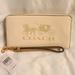 Coach Accessories | Coach Long Zip Around Wallet With Embossed Horse & Carriage | Color: Cream | Size: Os