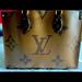 Louis Vuitton Bags | Louis Vuitton On The Go Mm Monogram Brown Coated Canvas Tote | Color: Brown | Size: Os