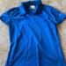 Nike Tops | Blue Nike Polo. Pretty Long So Can Fit A Medium. | Color: Blue | Size: S