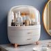 Everly Quinn Makeup Organizer in White | 14.76 H x 13.38 W x 8.46 D in | Wayfair CC10A6E9E67346D78B1CA1666AAB8AFC