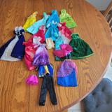 Disney Toys | 14 Dresses And 1 Prince Outfit For Disney Dolls, Good Condition | Color: Blue/Yellow | Size: Osbb