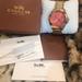 Coach Accessories | Coach Ny Gold Watch With Crystals And Coral Face | Color: Gold | Size: Os