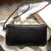 Coach Bags | *Host Pick* Coach Leather Logo Wristlet *New* | Color: Black | Size: Os