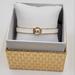 Michael Kors Jewelry | Michael Kors Gold + White Enamel Logo Bangle Bracelet | Color: Gold/White | Size: Os