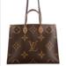 Louis Vuitton Bags | Louis Vuitton 2020 Reverse Monogram Giant Onthego Gm Tote Bag | Color: Brown/Tan | Size: Os