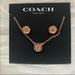 Coach Jewelry | Coach Open Circle Necklace And Tea Rose Stud Earrings Set | Color: Gold/Pink | Size: Os