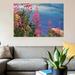 East Urban Home 'Fireweed Against Flowing Stream, North America' Graphic Art Print on Canvas Canvas/Metal in Blue/Indigo | Wayfair