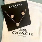 Coach Jewelry | Coach Open Circle Pendant Necklace With Tea Rose Stud Set In Rose Gold New Nwt | Color: Gold | Size: Os