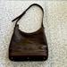 Dooney & Bourke Bags | Dooney & Bourke Embossed Leather Shoulder Bag | Color: Brown | Size: 10” X 10” X4”