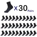 Chaussettes mi-tube en coton polyester respirant pour hommes chaussettes d'affaires noir doux