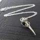 Collier tête d'oiseau tête de mort de corbeau 3D pour hommes style gothique bijoux en métal punk