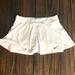 Nike Skirts | Nike Woman’s Victory Flouncy Tennis Skirt. Size L | Color: White | Size: L