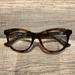 Gucci Accessories | Gucci Plastic Gg0167o Plastic Eyeglass Frame In Tortoise | Color: Brown/Tan | Size: Os