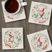 CounterArt Jolly Gnomes 4 Pack Assorted Image Absorbent Stone Tumbled Tile Coaster Stoneware in Brown/Green/Red | 0.25 H x 4 W x 0.63 D in | Wayfair