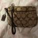 Coach Bags | Coach Small Wallet/Brown Clutch Signature Brown Cloth | Color: Brown/Tan | Size: Os