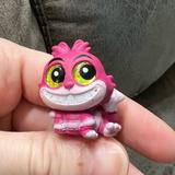 Disney Toys | Disney Doorables Series 7 Cheshire Cat Color Reveal | Color: Pink/White | Size: 1 Inch