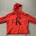 Urban Outfitters Tops | Calvin Klein Cropped Hoodie/Sweatshirt | Color: Orange/Red | Size: Xs