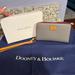 Dooney & Bourke Bags | Gently Used Dooney & Bourke Pebble Leather Wallet Wristlet! | Color: Gray | Size: Os