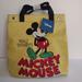 Disney Bags | Disney Women’s Yellow Nylon Mickey Mouse Tote/Travel Bag/Purse 12’ X 13’. | Color: Yellow | Size: 13x12"