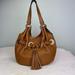 Michael Kors Bags | Michael Kors Braided Grommet Hobo Shoulder Bag W Tassel Acorn Brown Leather Euc | Color: Brown/Tan | Size: Os