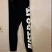 Nike Pants & Jumpsuits | Nike Just Do It Logo Tight Fit Leggings | Color: Black/White | Size: L