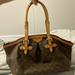 Louis Vuitton Bags | Louis Vuitton Tivoli New Discontinued Monogram Gm Brown Canvas Satchel | Color: Brown | Size: Os