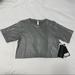 Lululemon Athletica Tops | Lululemon Soulcycle To The Beat Crop Tee Nwt Limited Edition Size 4 Metal Gray | Color: Gray/Silver | Size: 4