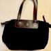 Dooney & Bourke Bags | D&B Nylon And Leather Domed Satchel. Used Once. Like New. Great Little Bag. | Color: Black | Size: W-12 1/2 In., H-8 In., D-5 1/2 In.