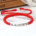 Bracelet en corde rouge porte-bonheur couleur argent Long Tube fleur sculptée tibétain bouddhiste