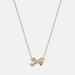 Coach Jewelry | Coach Pave Bow Pendant Necklace,Nwt. | Color: Gold | Size: Os