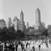 USA New York City Central Park People ice-skating in front of skyline Poster Print (18 x 24)