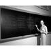 1950s Teacher In Front Of Classroom Writing Confidence On Blackboard Poster Print By Vintage Collection (22 X 28)