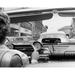 Rear view of a woman driving a convertible car Poster Print (24 x 36)