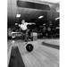 Posterazzi Mid Adult Man Rolling a Bowling Ball in a Bowling Alley Poster Print 18 x 24 in.