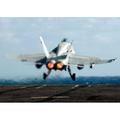 An F/A-18C Hornet launches from the flight deck of USS Enterprise Poster Print by Stocktrek Images (34 x 22)