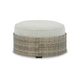 Signature Design by Ashley Contemporary Calworth Outdoor Ottoman with Cushion Beige