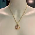 Coach Jewelry | Coach Tony Duquette Purple Swarovski Crystal Sunburst Pendant 18k/.925 Necklace | Color: Gold/Purple | Size: 18” In Length