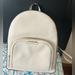 Michael Kors Bags | Michael Kors Cream Jaycee Medium Pebbled Leather Backpack | Color: Cream | Size: 8.75” X 12” X 4.25”