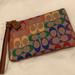 Coach Bags | Coach Wristlet In Tan Natural Multi Nwt | Color: Tan | Size: 7.5”L X 4.75”H X 0.5”W