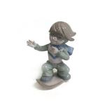 Boy On Snowboard Figurine