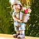 Garten-Kind Leon mit Pflanztopf