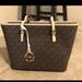 Michael Kors Bags | Michael Kors Jet Set Brown Mk Signature Zip Tote Tz Bag Gold Mk Charm | Color: Brown/Cream | Size: 10.5”X16”X13”X6”