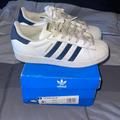 Adidas Shoes | Classic Adidas White With Blue Stripes Kids Size 6.5 | Color: Blue/White | Size: 6.5bb